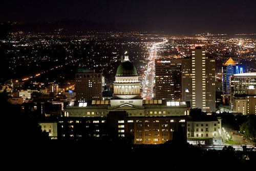 Salt Lake City lights behind the utah capitol dome